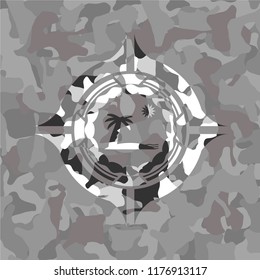 beach icon inside grey camo texture