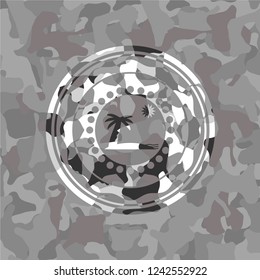 beach icon inside grey camo texture