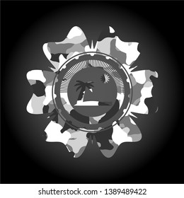 beach icon inside grey camouflage texture