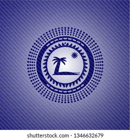 beach icon inside jean or denim emblem or badge background