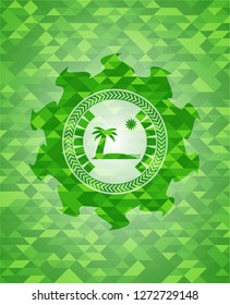 beach icon inside realistic green mosaic emblem