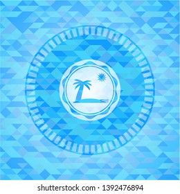 beach icon inside realistic light blue mosaic emblem