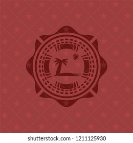 beach icon inside red emblem