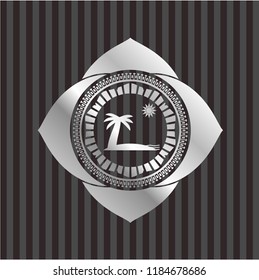 beach icon inside silver badge