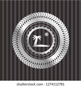 beach icon inside silver badge