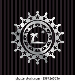 beach icon inside silver emblem