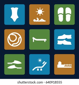 Beach icons set. set of 9 beach filled icons such as sunbed, slippers, swimsuit, avenue, man laying in sun