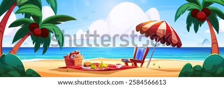 Beach picnic scene with wicker basket, sandwich and fruits on red blanket, lounger under striped umbrella. Sandy shore landscape surrounded by palm trees, blue ocean and white clouds in sunny sky.