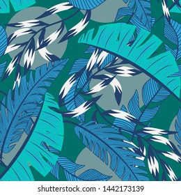 Beach seamless pattern with colorful tropical leaves and plants on green background. Vector design. Jungle print. Floral background. Printing and textiles. Exotic tropics. Bright design.
