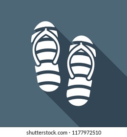 Beach slippers. Flip flops icon. White flat icon with long shadow on background