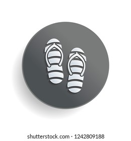 Beach slippers. Flip flops icon. White paper symbol on gray round button or badge with shadow
