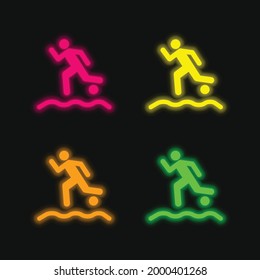 Beach Soccer Player Running With The Ball On The Sand four color glowing neon vector icon