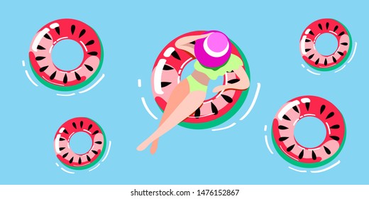 Beach summer vacation. People swim in the sea. Inflatable animals and rescue fruit circle
