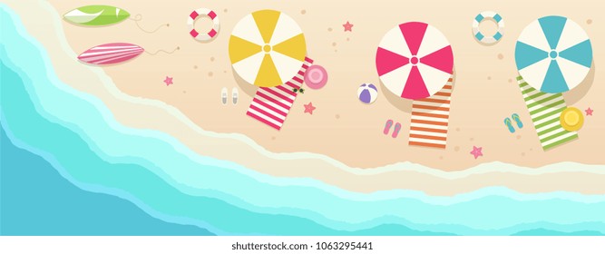 Beach, top view with umbrellas, towels, surfboards, sunglasses, hats, ball, starfish.