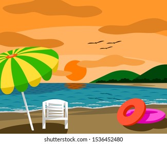 Beach with umbrella and chair during sunset, good atmosphere. The sea is beautiful and the mountains are seen far away. And there are birds flying on top.