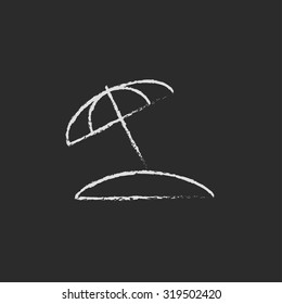 Beach umbrella hand drawn in chalk on a blackboard vector white icon isolated on a black background.