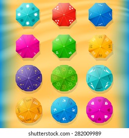 Beach umbrellas top view icons. On the background of the beach