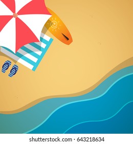 beach with waves, umbrellas, towels and orange surfing board