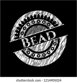 Bead chalk emblem written on a blackboard