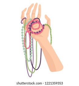 Beads of different flowers in a palm. Jewelry or decor