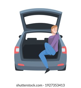 Beaming Man Sitting in Car Trunk Taking Picture Vector Illustration