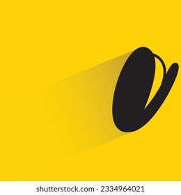 bean with shadow on yellow background