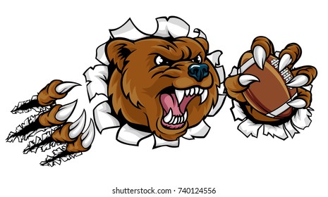 A bear angry animal sports mascot holding an American football ball and breaking through the background with its claws