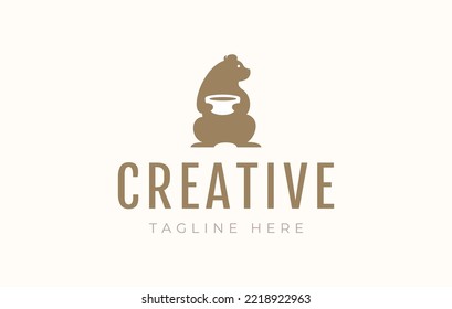 Bear Carrying Bowl Simple Logo Design Template