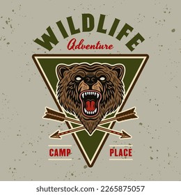 Bear colored emblem, badge, label or logo for camping and outdoors in vintage style vector illustration