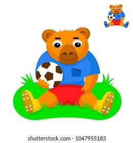 Bear football player with the ball sitting on the green grass