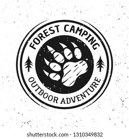 Bear footprint vector vintage round camping emblem, label, badge or logo isolated on white background