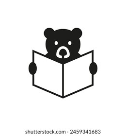 Bear with glasses reading a book and holds her in his paws. Vector silhouette on white background.