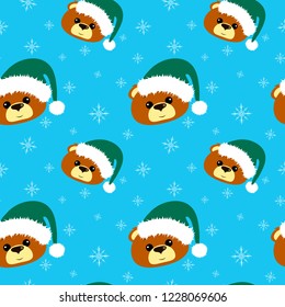 Bear with green santa cap seamless pattern with white snowflakes on blue ground