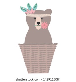 bear grizzly with feathers hat in basket straw bohemian style