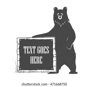 Bear holding signboard