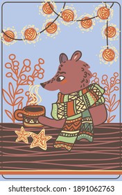 the bear, at home, drinks hot tea with gingerbread to keep warm in winter