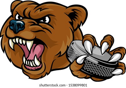 A bear ice hockey player animal sports mascot holding a hockey puck