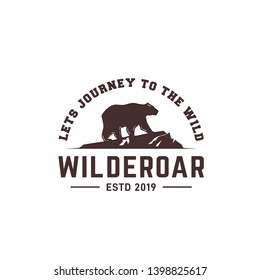 bear logo design with arch text above