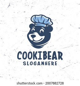 bear logo wearing a blue chef hat