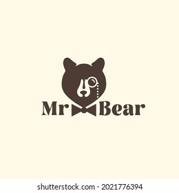 Bear with monocle and bow tie logo design template. Vector illustration.