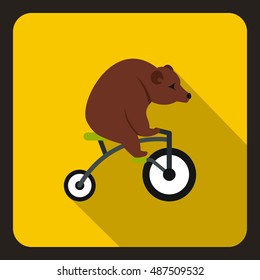Bear on a bike icon in flat style on a yellow background vector illustration