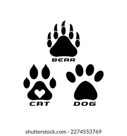 Bear paws, Dog paws and Cat paws .Different animal paw . Paw Prints. Black paw .Paw icon vector illustration isolated on white background. Dog, cat, bear, wolf . Legs. Foot prints. 