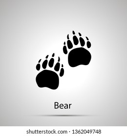 Bear paws, steps imprints, simple black silhouette