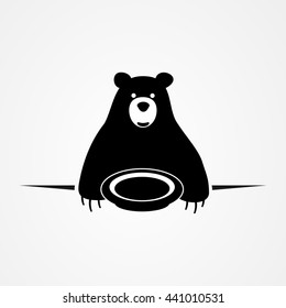 Bear with plate of meal