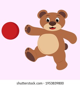 bear playing outside with a red ball