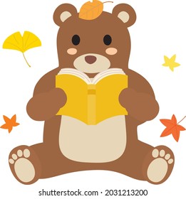 A bear reading a book in Autumn of reading