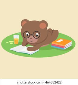 Bear reading book lying down