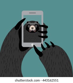 Bear Selfie. Grizzly Photographed Themselves On Phone. Angry Wild Animal And Smartphone
