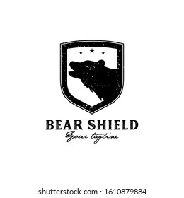 Bear shield emblem logo design strong and bold badge featuring a bear head or silhouette within a shield shape, perfect for sports teams, outdoor brands, security services, adventure clubs