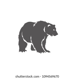 Silueta de oso aislada en ilustración vectorial de fondo blanco. Emblema gráfico vectorial del oso de pie.